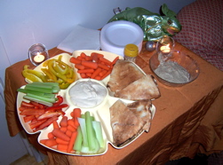 Crudités and a stuffed lizard