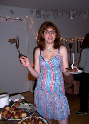 Mikhaela cuts the rum cake